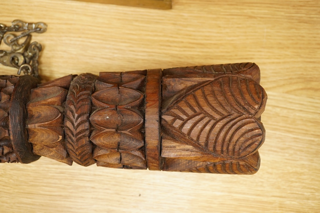 An African carved wood and cow-horn oliphant, 90cm